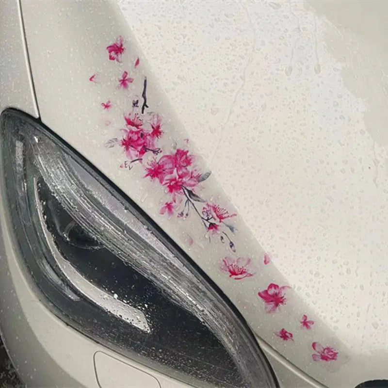Cherry blossom floral pattern car sticker on a vehicle door, shown in two size options.