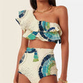 White women's one-shoulder swimsuit with lotus leaf pattern and split skirt design