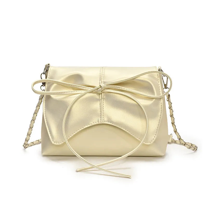 A black horizontal square underarm crossbody bag with large capacity and visible sewing lines.