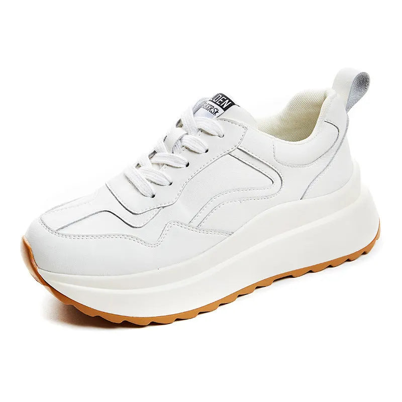 Beige women's low-top lace-up casual shoes with cowhide leather upper and cross strap detail.