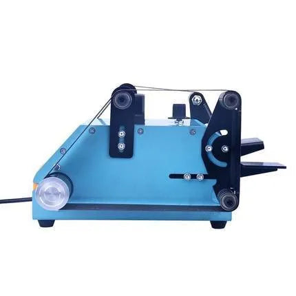 Blue desktop dual-axis belt sander with abrasive belt, variable speed switch, and compact metal housing.