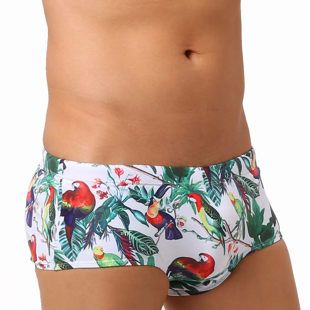 Men's swimming trunks with flower and bird print design in nylon fabric for beach and pool swimming