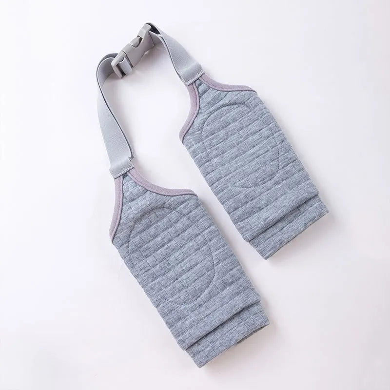 Blue dog knee protector sleeve with padded elbow patch and matching scarf, showing plastic buckle adjustment.