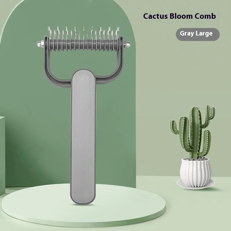 Green and grey pet hair unknotting comb for dogs with stainless steel teeth on a plastic handle.