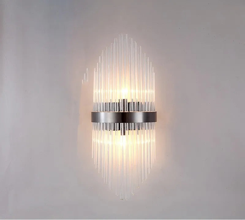 Modern wall lamp with crystal petal shade in titanium gold or black metal finish
