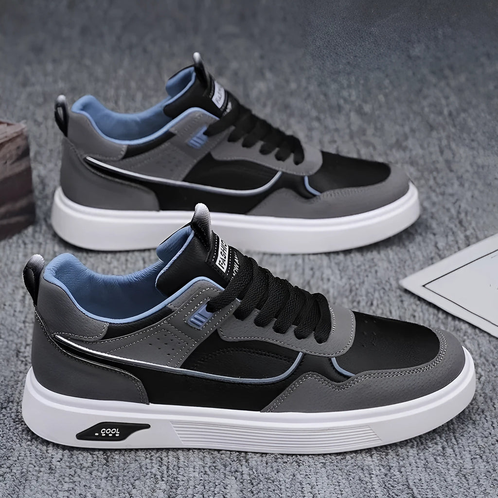 Men's low-top canvas board shoes in black, beige, and grey with mesh lining and leather stitching