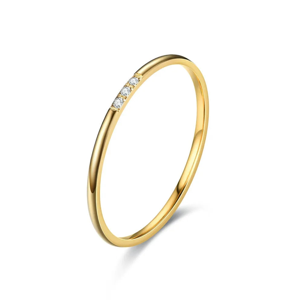Stainless steel diamond-set ring in silver, gold or rose gold with 1 or 3 round stones, sizes 5 to 11