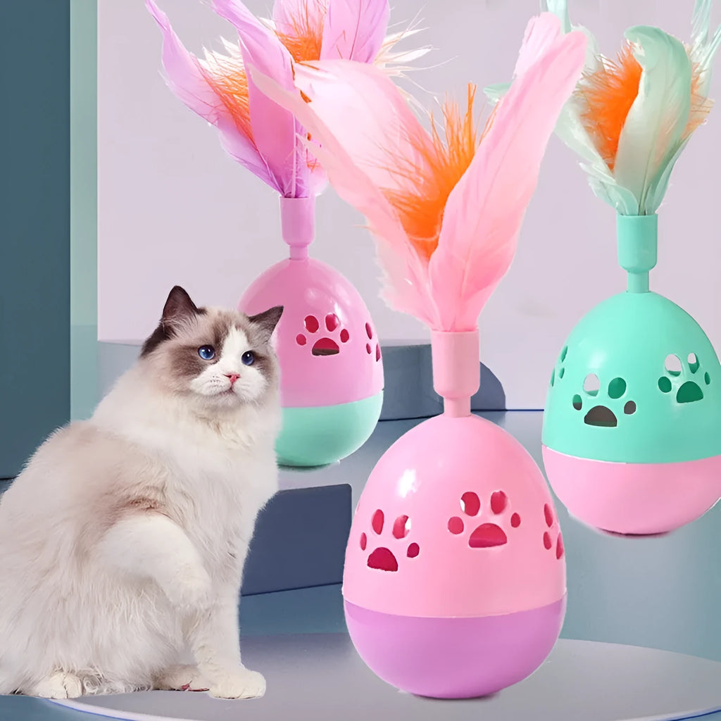 Tumbler bell cat toy in pink purple green, 15cm ABS plastic body with feathers and 6.5cm base