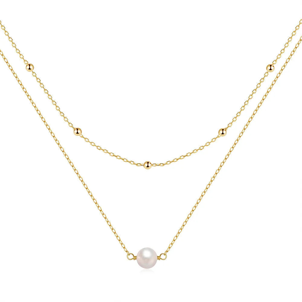 Sterling silver double layer necklace with twin pearls and geometric pendant in gold colour