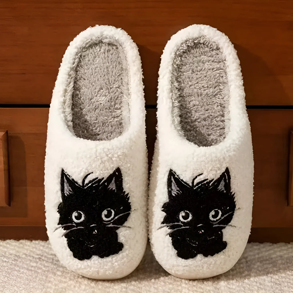 White plush slippers with Black Beard Cat cartoon couple pattern and non-slip sole.
