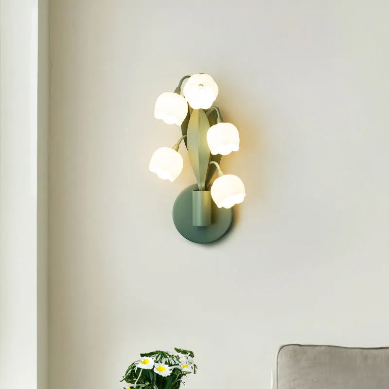 Green tricolour French pastoral wall lamp with minimalist Nordic design and white PC shade mounted on a wall.