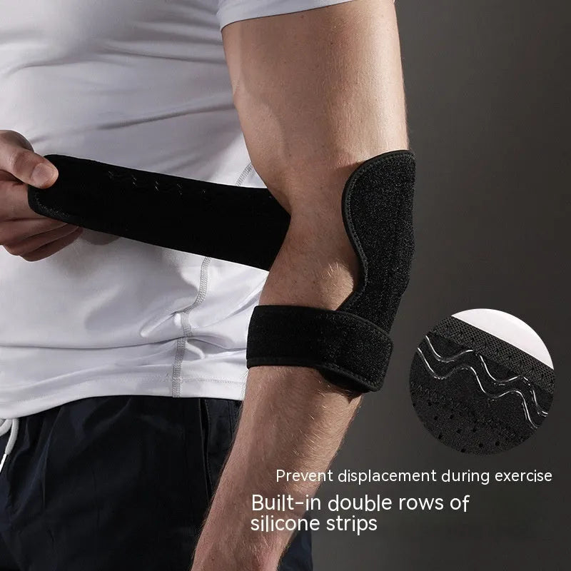 Black adjustable sports elbow guard worn on arm for basketball and badminton support