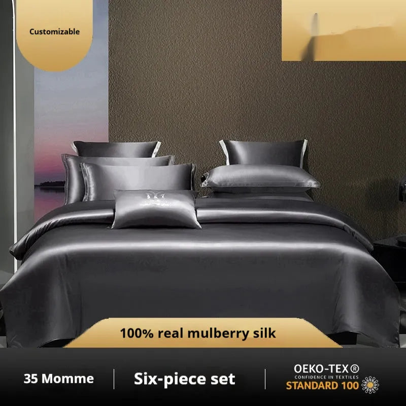 Silk bed linen four-piece set in solid colour showing quilt cover and matching sheets