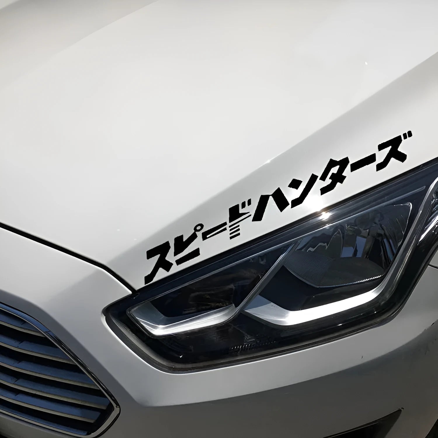 Black and white reflective Japanese car sticker measuring 35x35cm on adhesive backing.