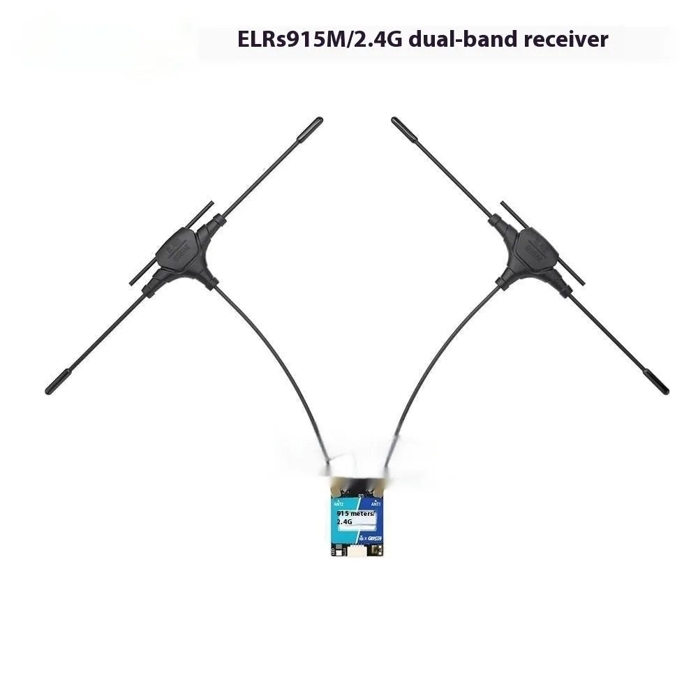 ELRS dual-band FPV receiver module with two T-shaped antennas and silicone wire on a workbench.