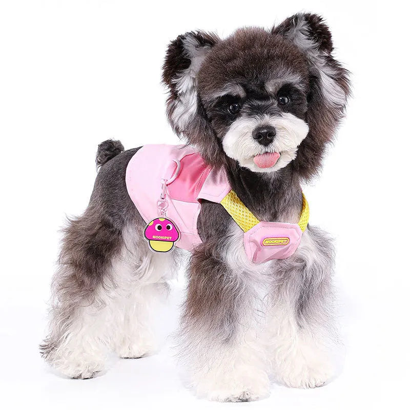Pink polyester pet vest for small dog breeds on size chart showing XXS to XXL options