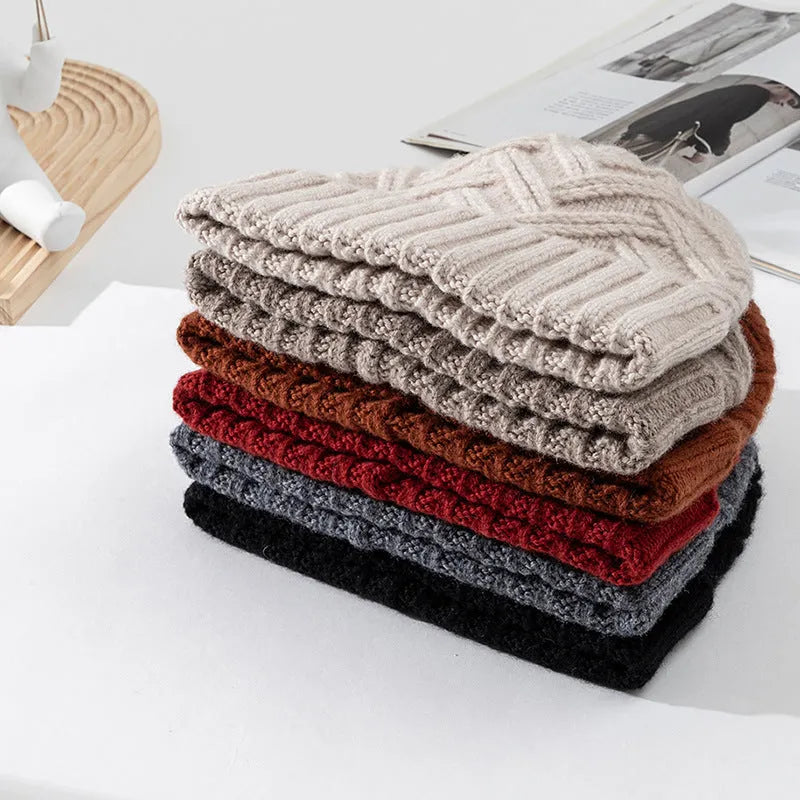 Wool knitted dome crown women's hat in six colour options showing totem patterning detail