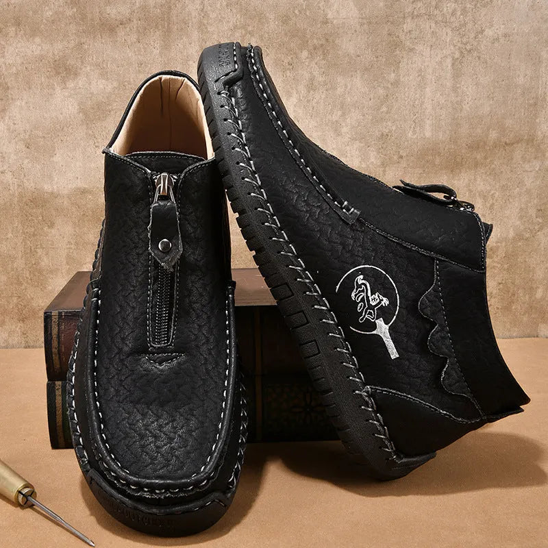 Men's black slip-on leather loafers with round toe and flat rubber sole