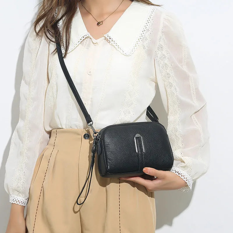 Genuine leather women's square shoulder bag in black, shown with dimensions 19cm by 13cm by 6cm.