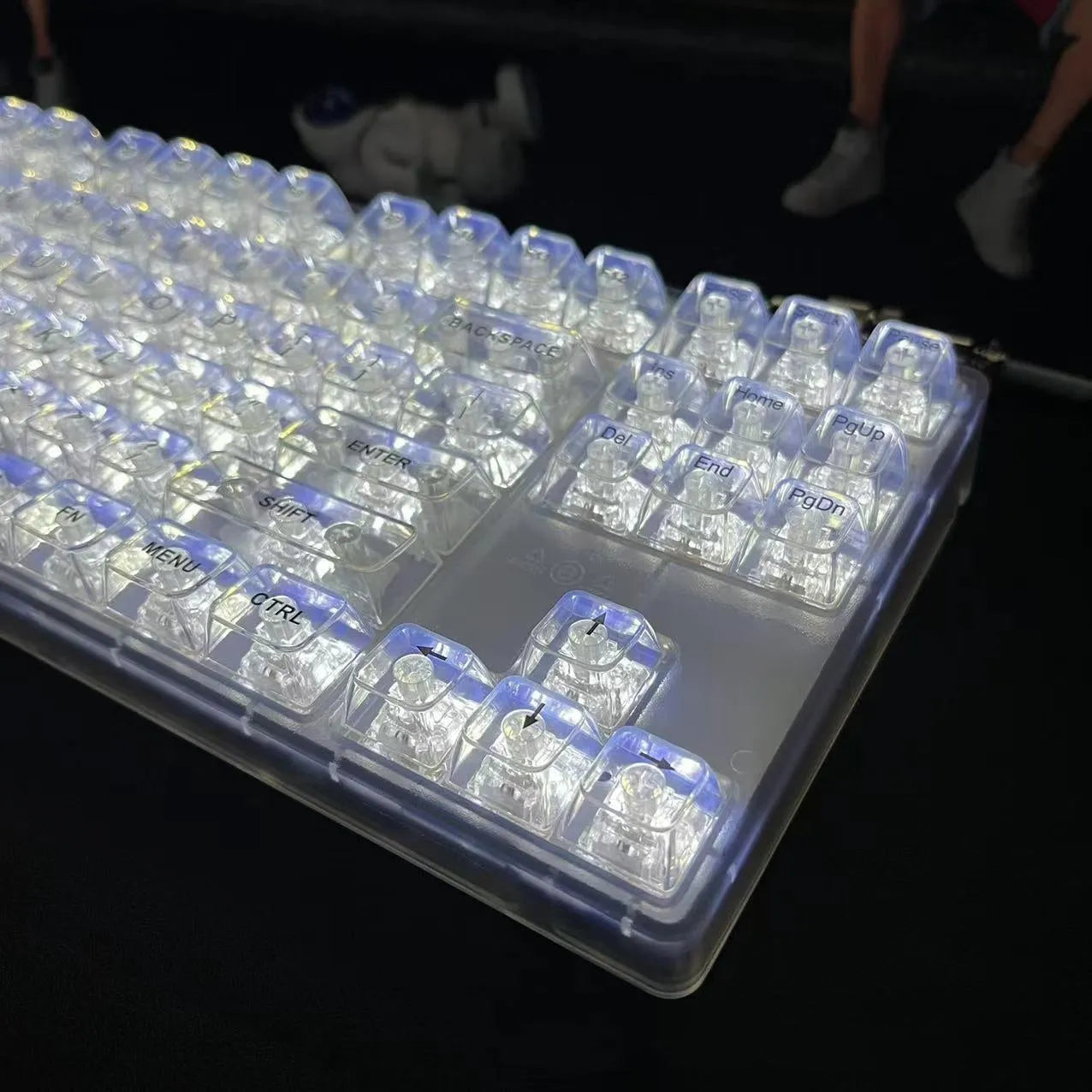 Transparent plastic mechanical keyboard key cap set with 132 pieces arranged for full keyboard coverage