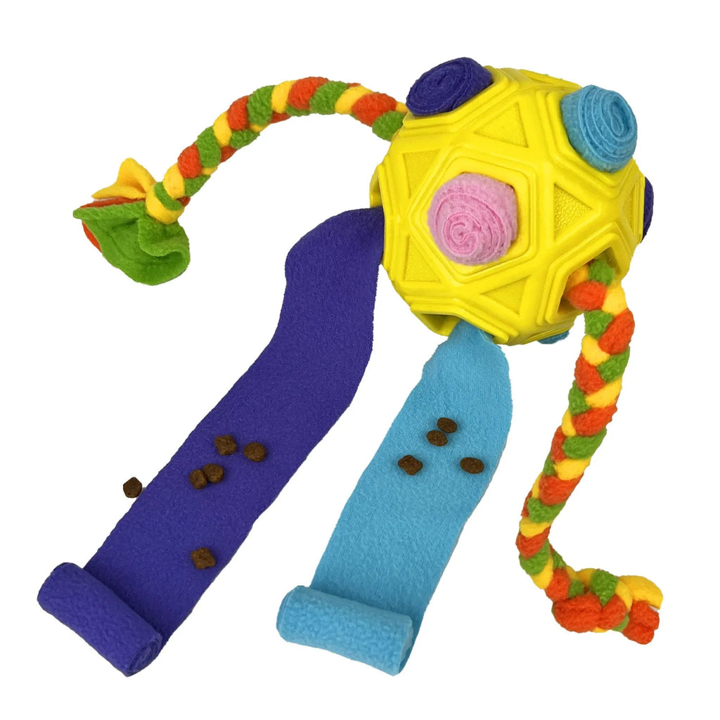 Blue Sniffing Ball dog puzzle toy for IQ training and treat dispensing on a wooden floor
