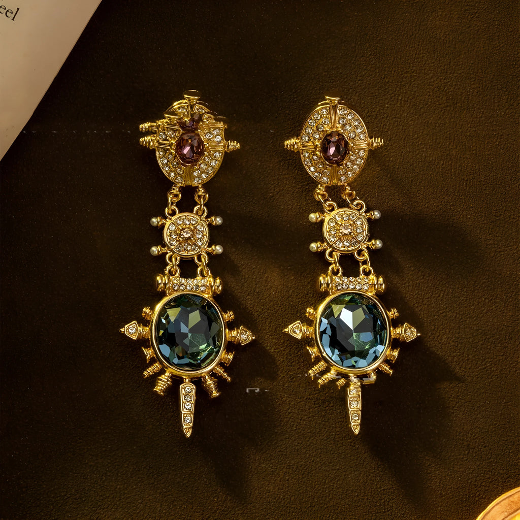 Pair of geometric gold retro stud earrings with diamond treatment surface