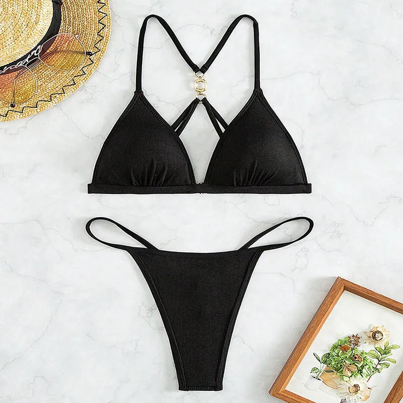 Black women's hollow backless bikini set with triangle top and matching high-waisted swim bottoms