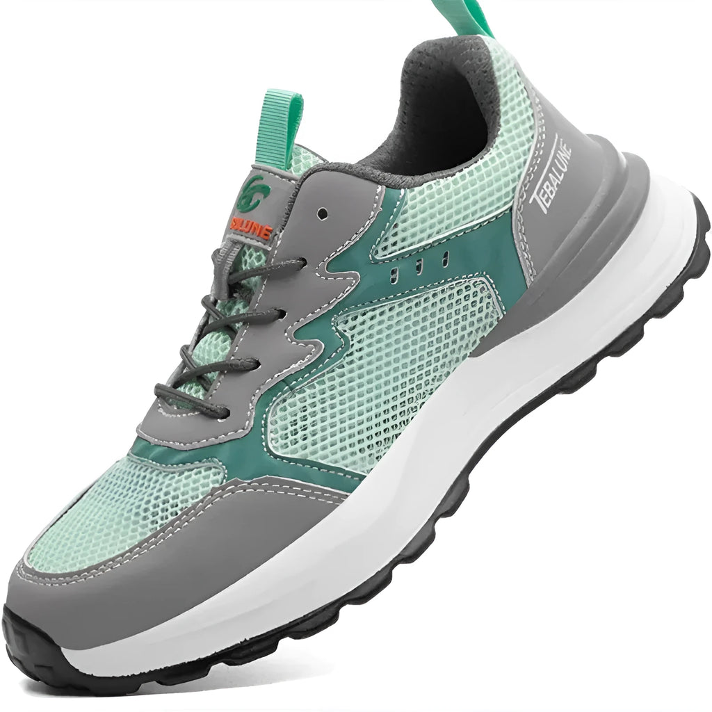 Green low top work shoes with mesh panels and plastic steel toe cap