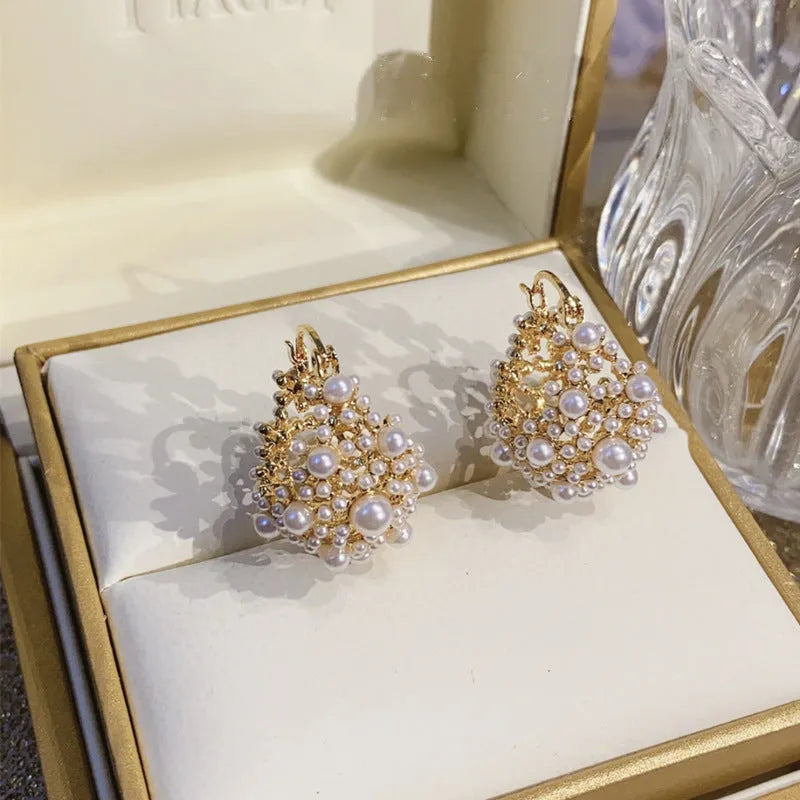 Women's gold colour copper flower basket earrings with small rice-shaped bead inlay floral pattern