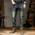 Men's retro colour skinny jeans with a zip fly, shown laid flat.