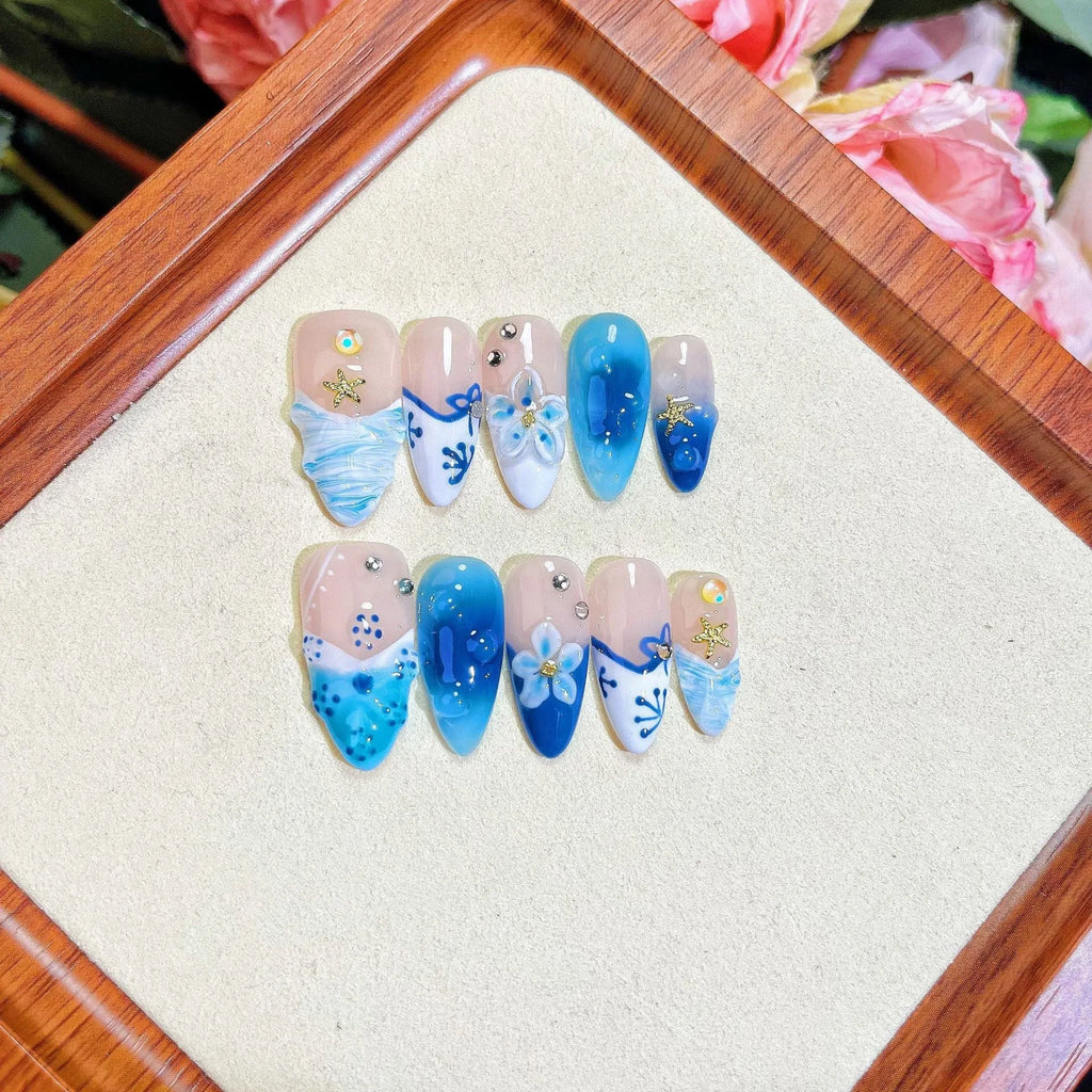 Blue hand-painted carved summer ice transparent plastic fake nails set in sizes XS to L