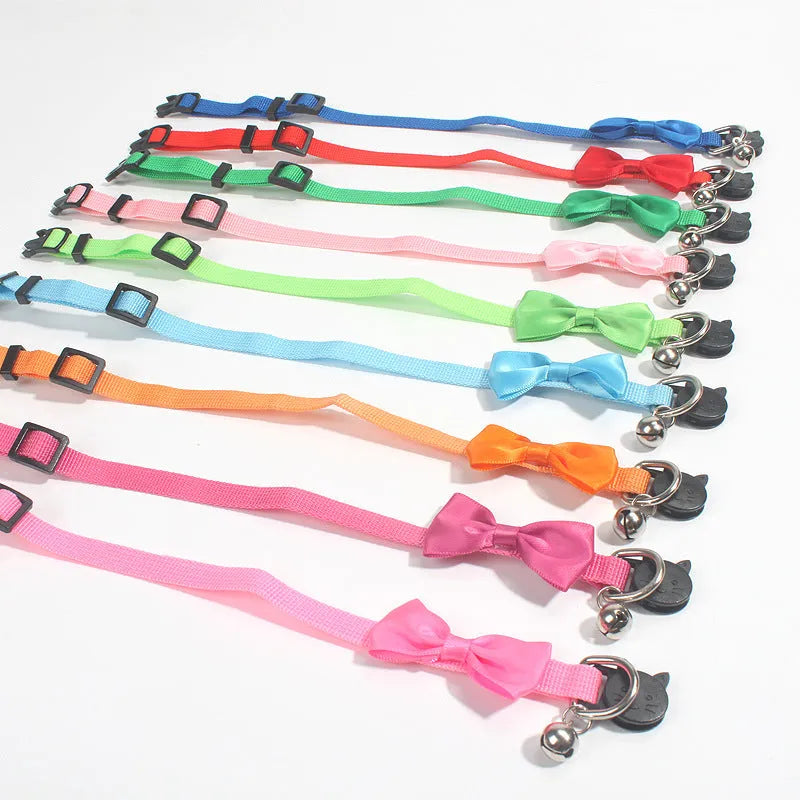 Striped nylon bow cat collar with bell in fluorescent green colour option