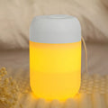 White cylindrical USB-powered mini humidifier with charging cable