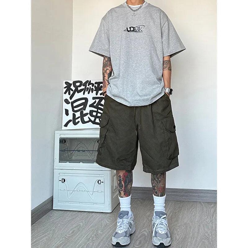 Loose straight casual shorts in polyester fiber featuring micro elasticity and sports style design in black blue green or khaki