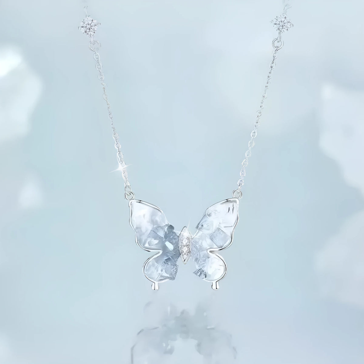 S925 silver necklace with detailed butterfly pendant and O-ring chain on display