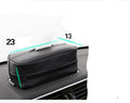 Black PU leather car storage box with hanging straps shown on a car headrest.