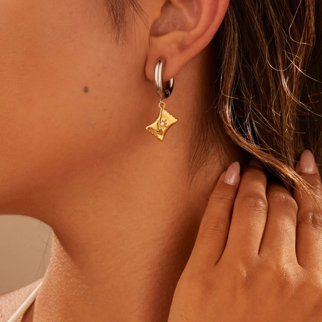 Christmas Tree Heart Earrings in stainless steel with 18K gold electroplating showing heart and star geometric designs