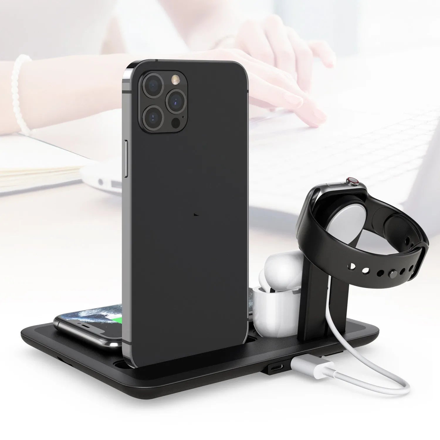 Black desktop wireless charging station for phone with watch and headphone charging outputs