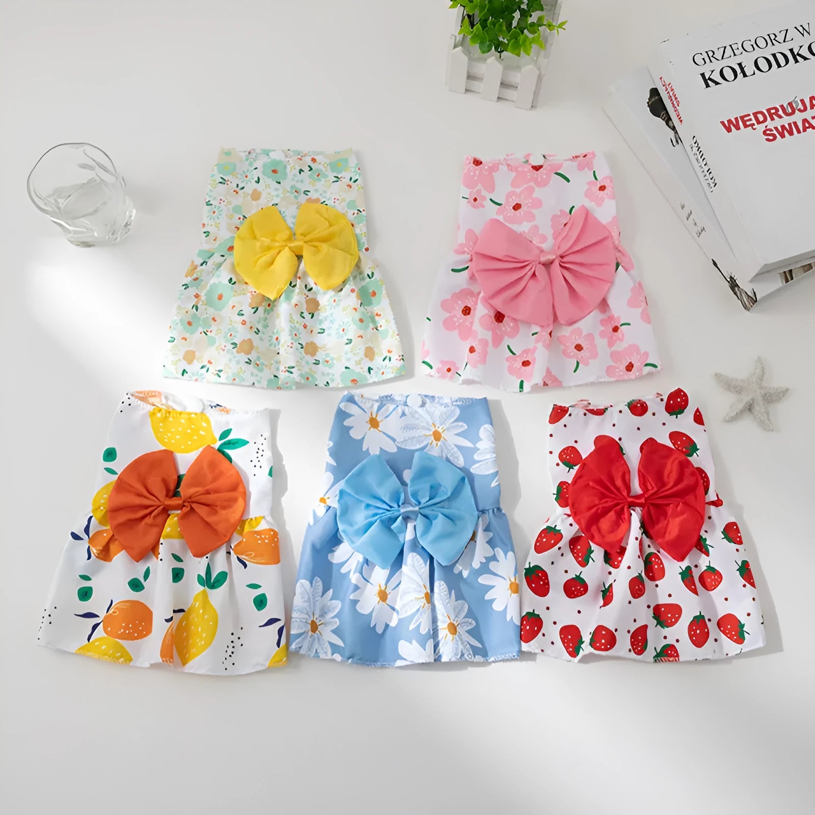 Orange floral butterfly knot princess dress on dog showing ultra-thin summer pet clothing