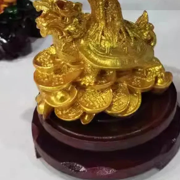 Citrine coloured resin Chinese style ornament of a small water turtle with a money tree.