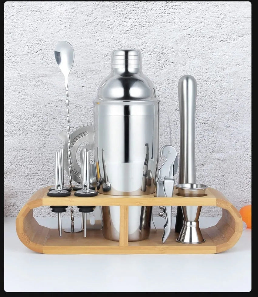 23-piece stainless steel cocktail set with acrylic shaker on home bar