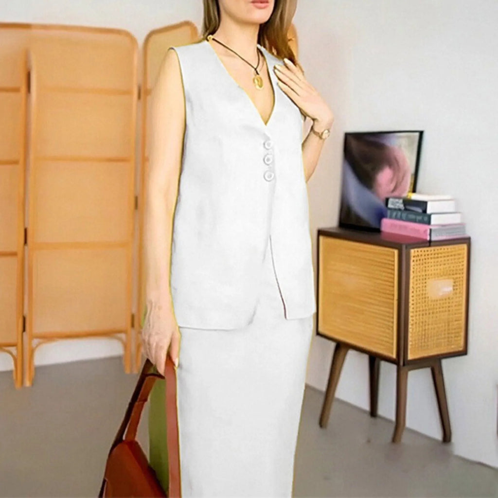 Women's blue polyester two-piece suit with sleeveless vest and long skirt on hanger