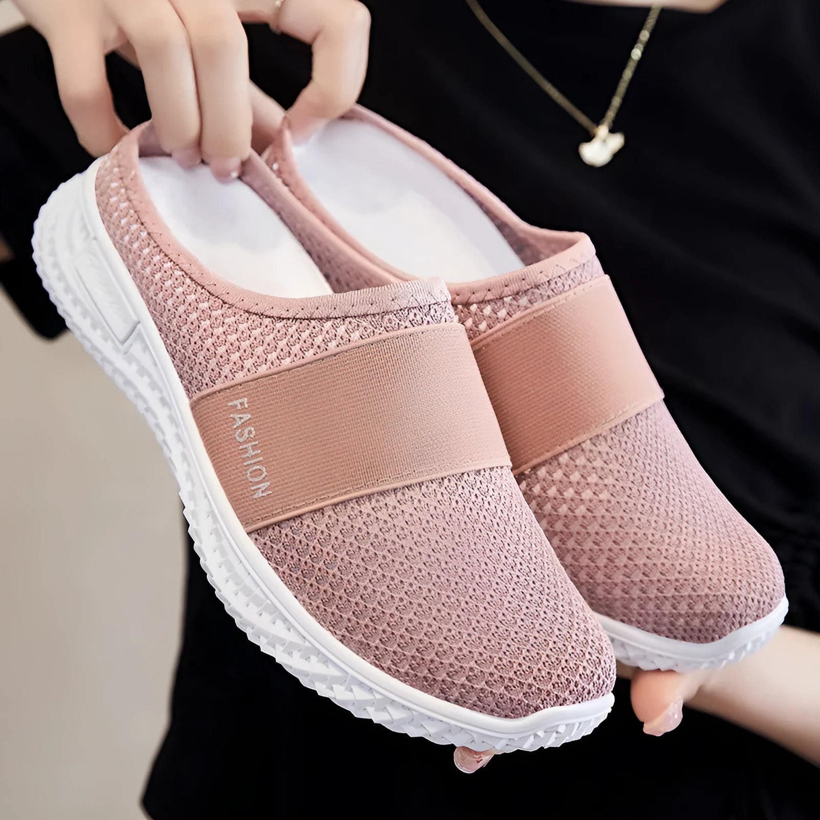 Women's breathable mesh casual shoes with hollow-out detailing in black, grey, pink, or purple colours