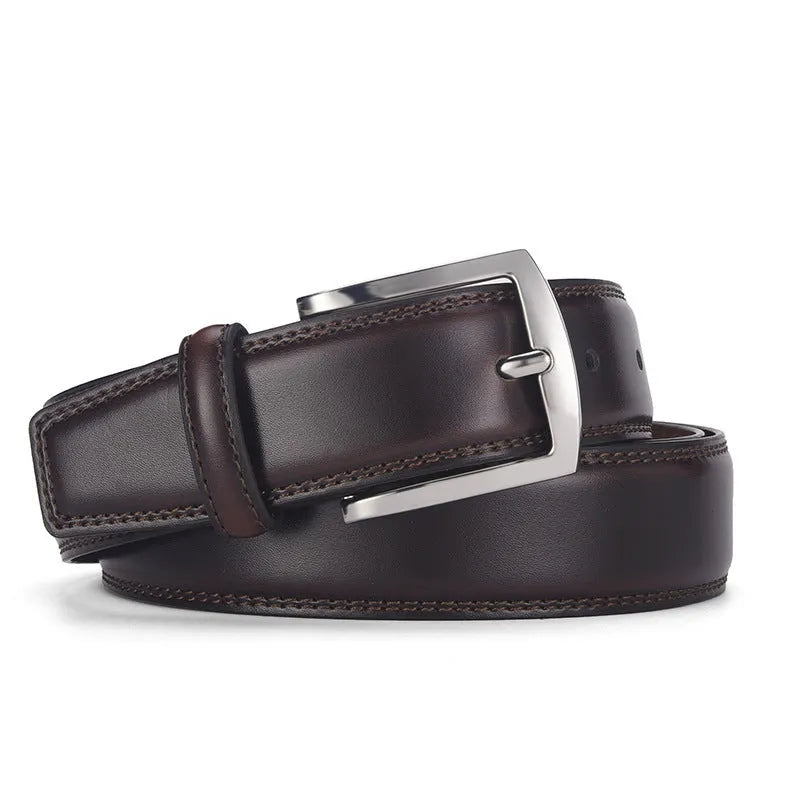 Men's black genuine leather belt with a silver alloy pin buckle fastener on a plain background