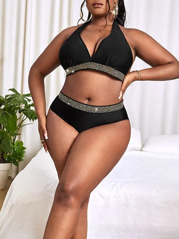 Black plus size women's bikini set with matching bra and shorts for swimming