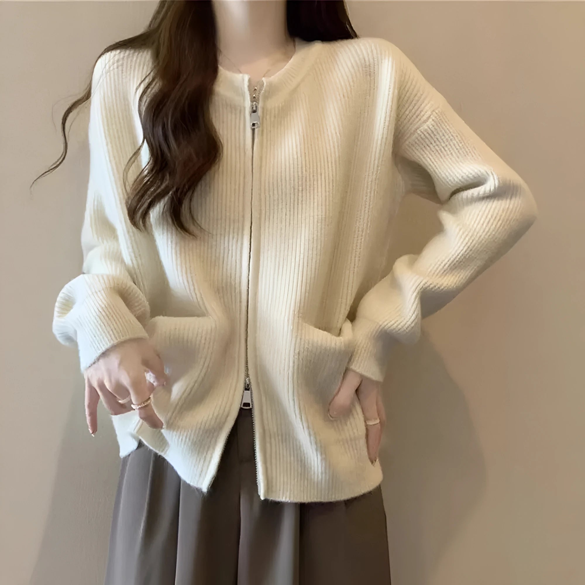 Women's beige viscose knit sweater coat with long sleeves and cardigan style