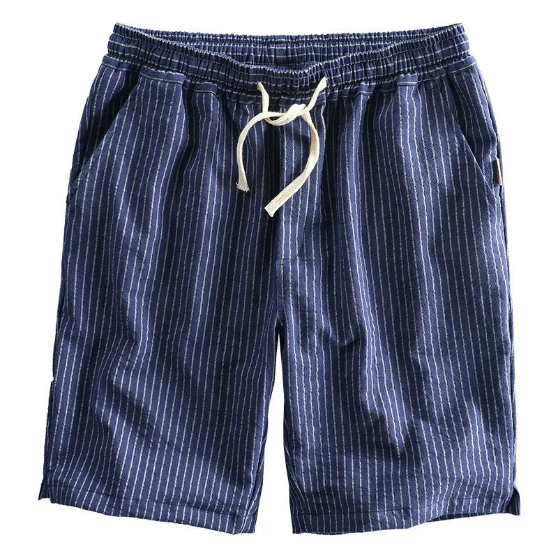 Men's striped cotton shorts in multiple colours showing loose straight cut and mid-waist design