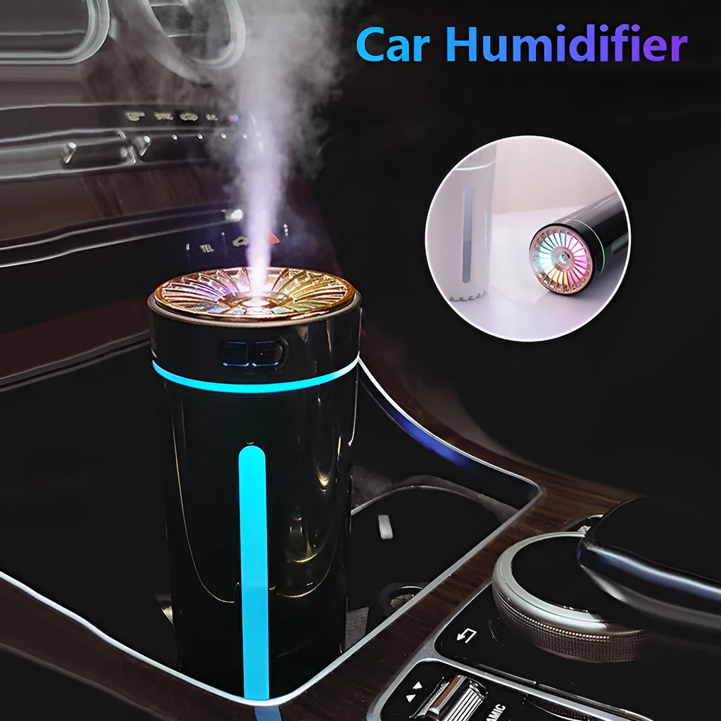 Black USB rechargeable ultrasonic humidifier with LED lights on a car cup holder