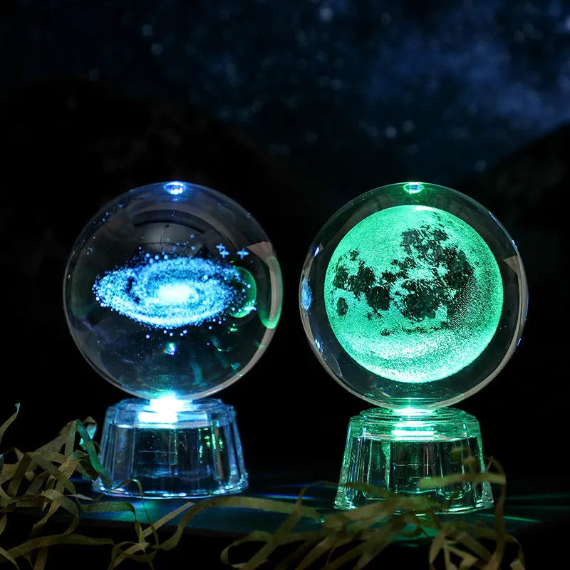 Transparent white crystal ball ornament with inner carving design measuring 6cm in diameter