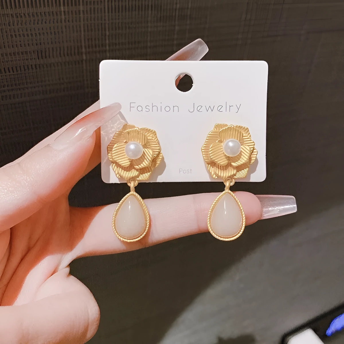 Hong Kong style gold colour floral stud earrings with opal stones and needle rose design